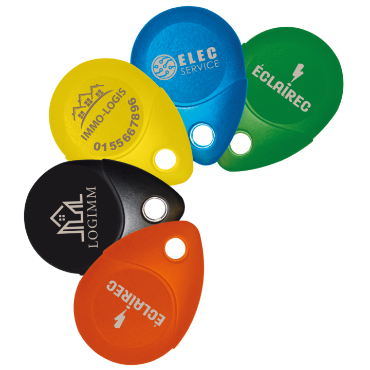 Clé Mifare 13.56 MHz blanche,  IP68, antichoc IK8, avec œillet métallique .